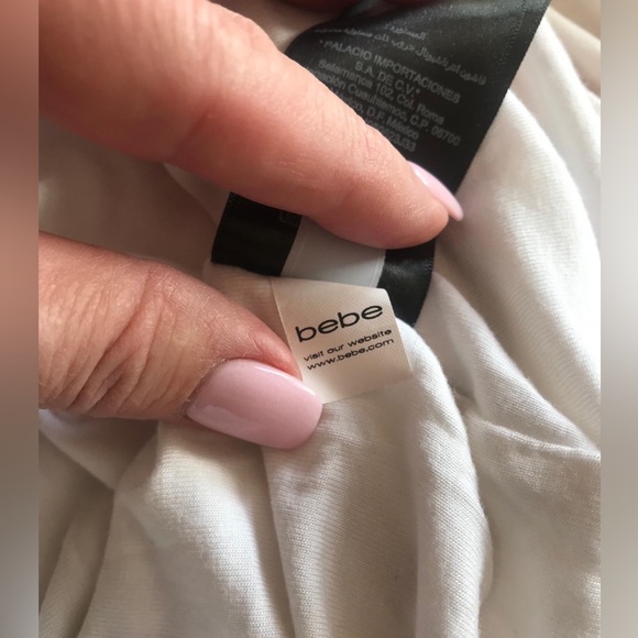 Bebe three colored long sleeve high low dress in sz M. Great condition. - Picture 14 of 15